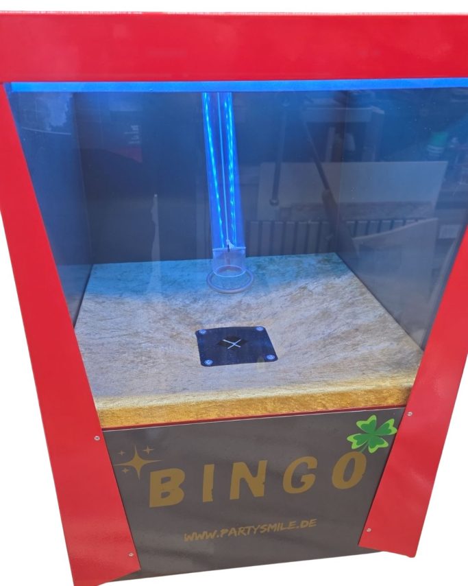 Bingomaschine Bingo-Automat mit sandartiger Oberfläche und transparentem Sichtfenster.